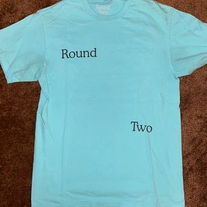 Round Two Store release tee. Size medium great condition extraordinary rare.